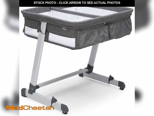 Lot 74-12918977 - Simmons Kids By The Bed City Sleeper Bassinet for Twins - Adjustable Height Portable Crib with Wheel...
