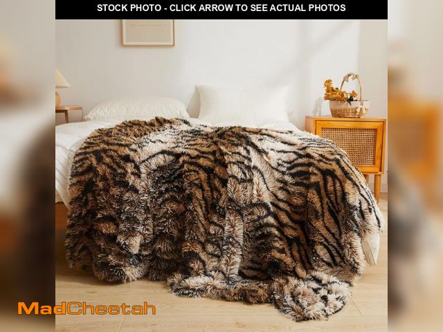 Lot 74-12123344 - XeGe Luxury Faux Fur Throw Blanket, Soft Tiger Print Big Fluffy Bed Blanket, Shaggy Plush Decorative...