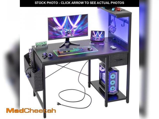 Lot 74-12538744 - TIQLAB Gaming Desk 40 inch with Power Outlet and LED Light, Computer Desk with Reversible Shelves an...
