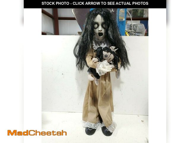 Lot 74-12771584 - Home Accents Holiday 3 ft ANIMATED Creepy Girl with Doll - UNUSED