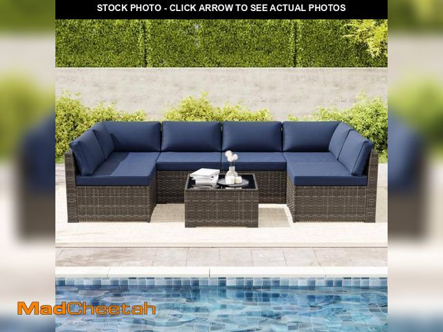 Lot 74-12251033 - 7-Piece Brown Wicker Outdoor Patio Sectional Set with Blue Cushions - UNUSED