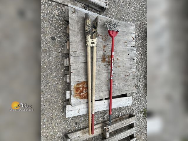 Lot 83-3751 - Hand posthole digger and garden tiller