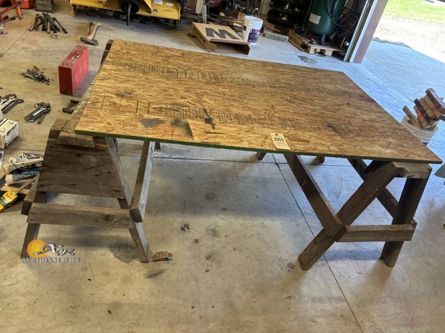Lot 83-2953 - Two Saw Horses and OSB Top