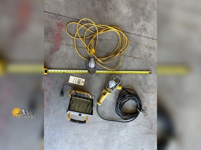 Lot 83-2300 - Two Light Extension Cords and Work Light