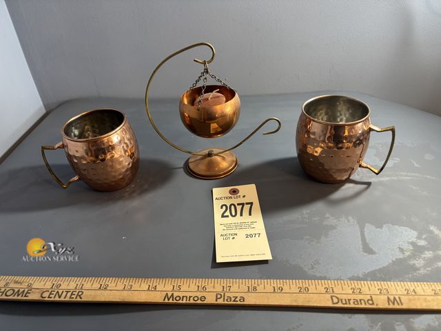 Lot 83-2077 - Copper Mule Mugs and Copper Hanging Pot