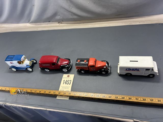 Lot 83-1453 - Four Vintage Die-Cast Coin Banks, Craftsman Truck, and Clarks Super Gas Tanker