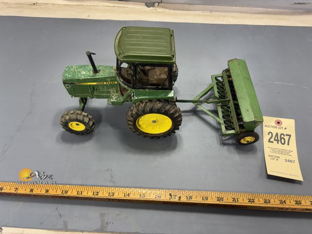 Lot 83-2467 - John Deere Tractor with John Deere Grain Drill Farm Toys
