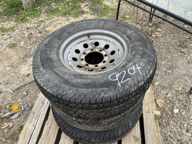 Lot 83-9204 - Two 225/90-D16 Tires and Wheels, and One 245/75-16 Tire and Wheel