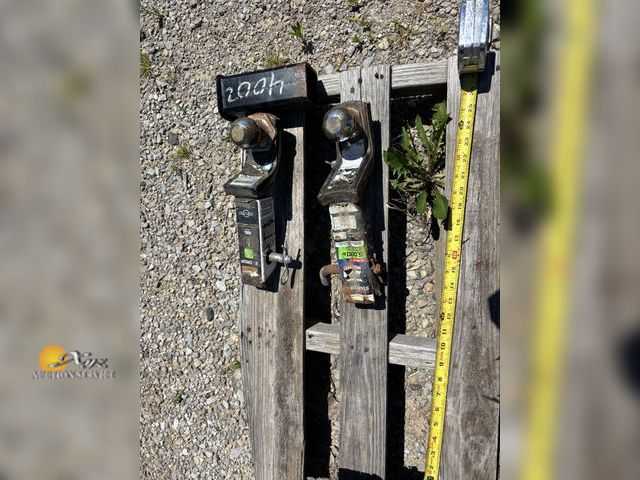 Lot 83-4002 - Two Hitches and Adapter