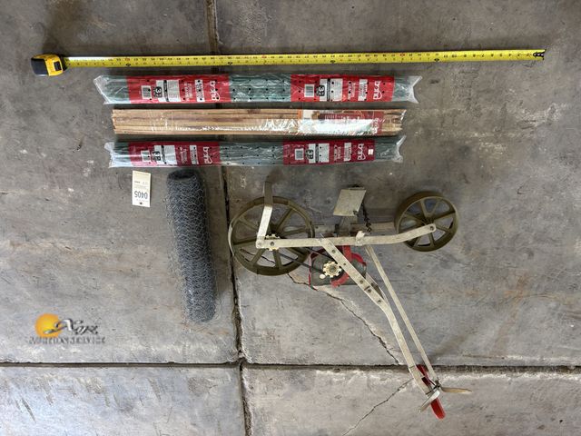 Lot 83-0450 - Lot of Gardening Stakes, Fence, and Seeder