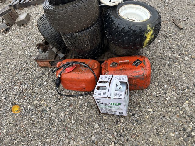 Lot 83-1071 - Lot of Miscellaneous Tires, Barrel Pump, Gas Tanks, and DEF