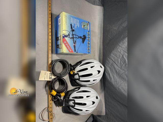 Lot 83-0136 - Two Bike Hoists, Two Bike Helmets, and Two Bike Locks