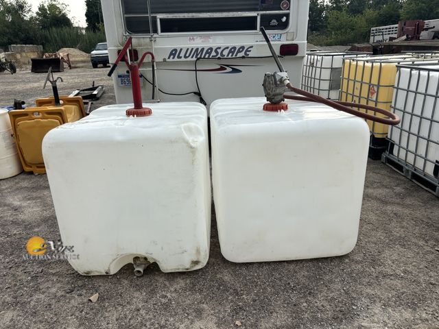 Lot 83-5001 - Two 275 gallon Poly Tanks with pumps