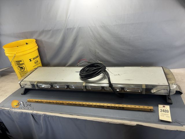 Lot 83-2489 - Whelen Emergency Light Bar with Siren