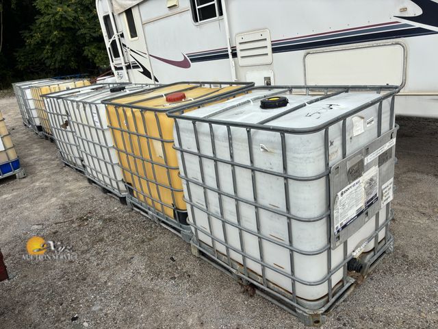 Lot 83-5004 - Four 275 Gallon Totes