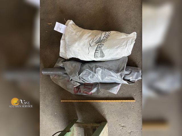 Lot 83-3003 - Lot of Feed Bags and Roll of Tyrac