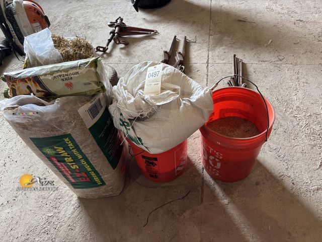 Lot 83-0497 - Lot of Grass Seed, Sand, Straw, and Wood Log