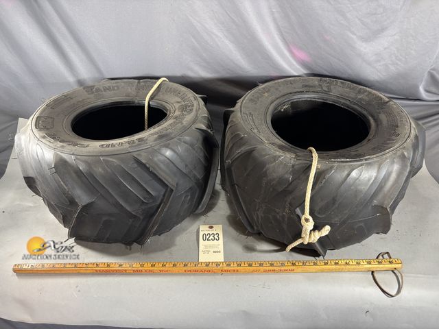 Lot 83-0233 - Two 21.0-12.0/10 Sand Tires