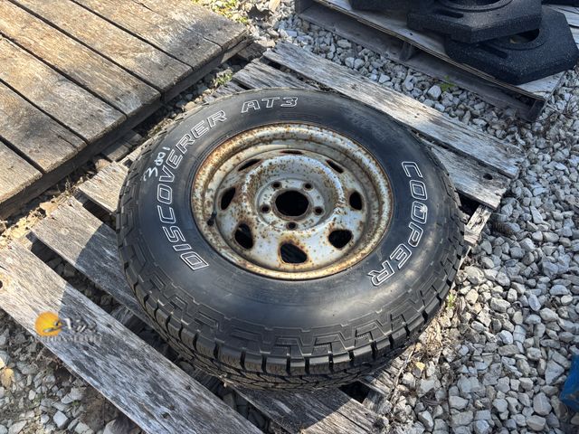 Lot 83-3001 - One Chevy 540 Wheel with New 235/R15 Tire