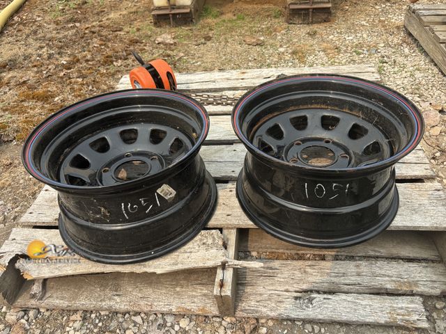 Lot 83-1051 - Two 5 Lug Chevy Wagon Wheels