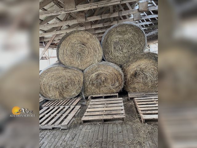 Lot 83-6006 - 20-4x5 Round, net wrapped, stored inside, 1st cutting, Mixed hay, Mostly Grass. Located in Gaines, F...