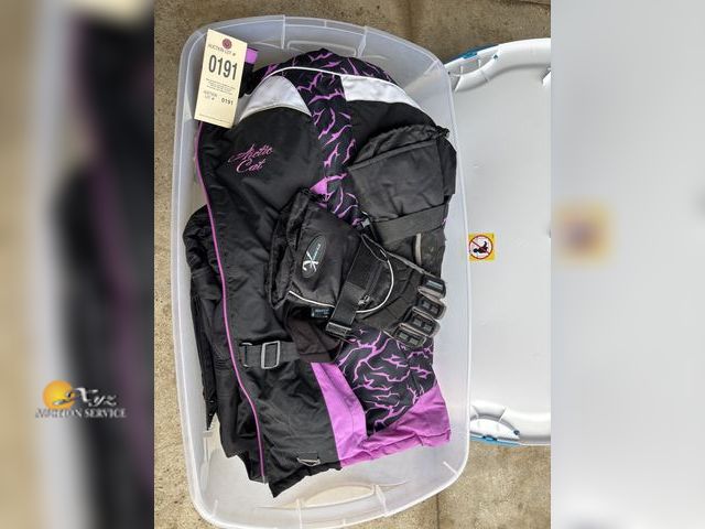 Lot 83-0191 - Women's Arctic Cat Jacket XL, Arctic Cat Bibs XL, Castle Boots Size 9, HJC Helmet Size XL, and Glove...