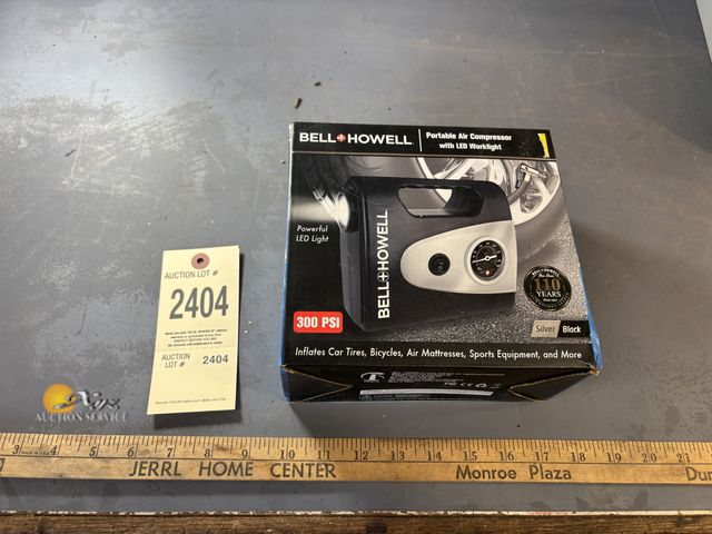 Lot 83-2404 - Bell Howell Portable Air Compressor