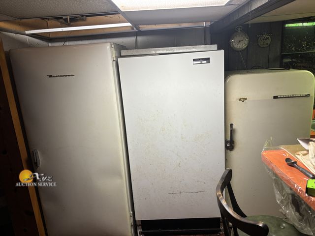 Lot 83-8001 - Manitowoc, Sears, and Frigidaire Two Freezers and Refrigerator Refrigerator Upright Freezer
