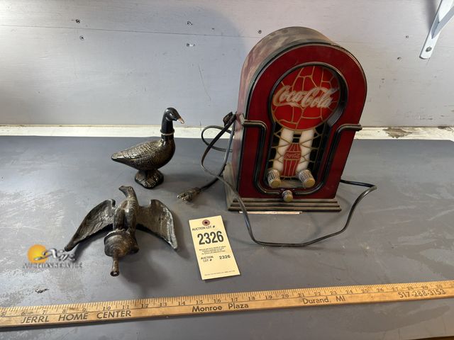 Lot 83-2326 - Coca-Cola Stained Glass AM/FM Radio, Avon Goose After Shave Bottle, and Antique Eagle Pole Topper