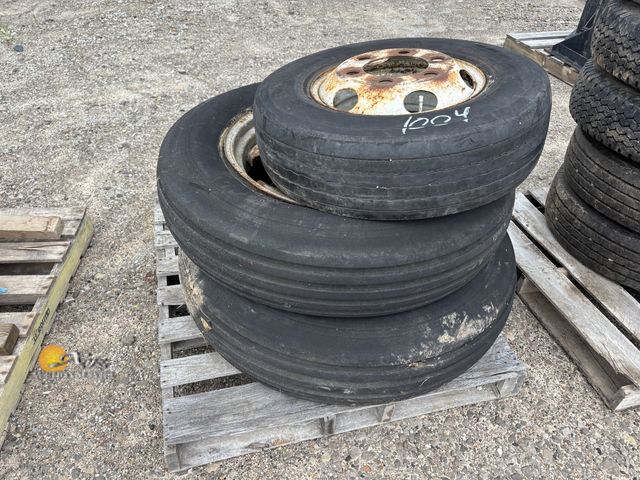 Lot 83-1004 - Two 24in Implement Mounted Tires and One 17.5in Mounted Tire