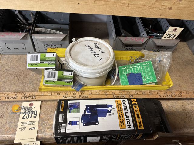 Lot 83-2379 - Lot of Miscellaneous Fence Staples and Gate Latch