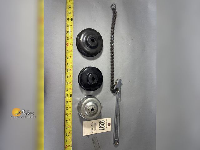 Lot 83-0207 - Filter Wrench and Filter Housing Caps
