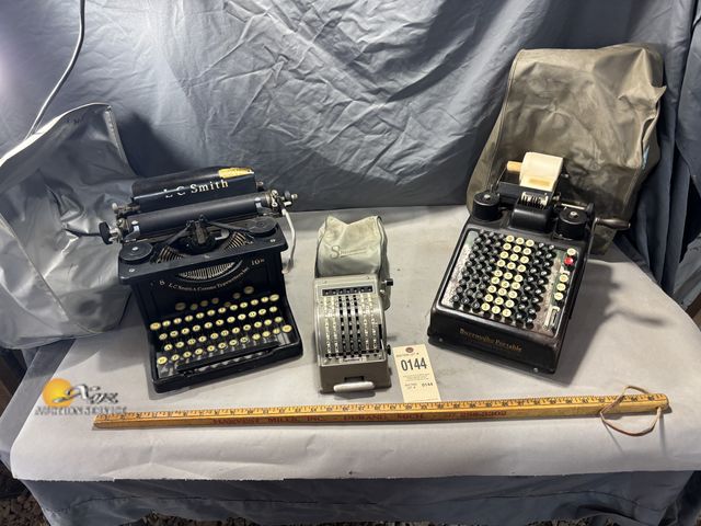 Lot 83-0144 - LC Smith Typewriter, Summira Adding Machine, Burroughs Portable Adding Machine
