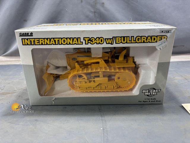 Lot 83-2619 - Case IH 1/16 Scale International T-340 with Bullgrader Toy