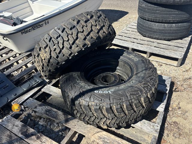 Lot 83-3000 - Two Black Wagon Wheels with 31x10.50 15LT Tires
