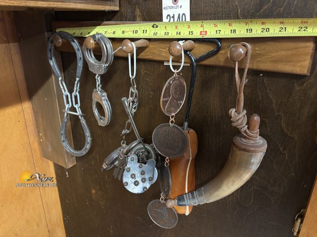 Lot 83-2140 - Vintage Smith and Wesson Handcuffs, Powder Horn, Large Decorative Coins, Padlock with Keys and other...