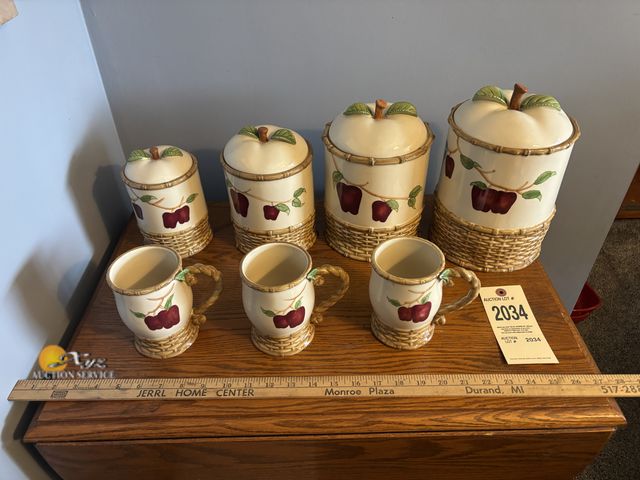 Lot 83-2034 - Four Ceramic Apple Basket Jars and Three Mugs