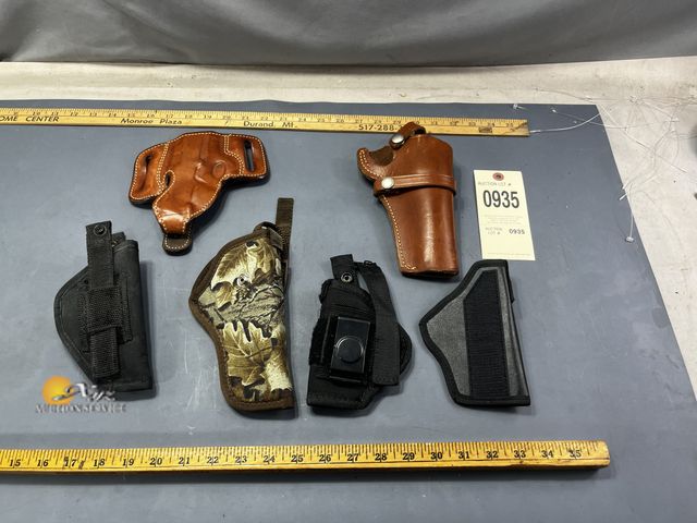 Lot 83-935 - Five Miscellaneous Pistol Holsters