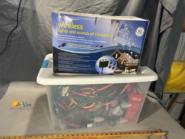 Lot 83-0139 - Lot of Miscellaneous Christmas Lights, Extention Cords, and Wireless Lights and Sounds of Christmas