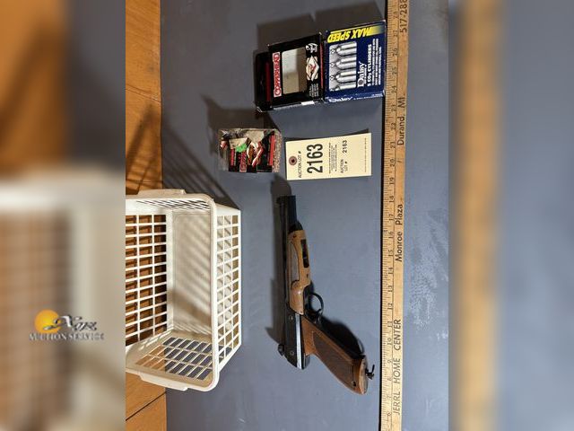 Lot 83-2163 - Air-Gun Pistol, Co2 Cartridges, and BB's