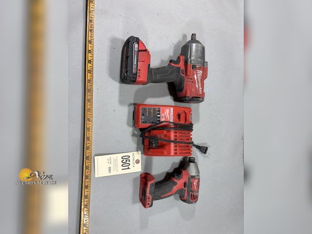 Lot 83-0501 - Milwaukee Impact Driver, Impact Wrench, and  Battery Charger