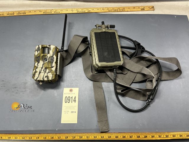 Lot 83-914 - Stealth Cam and Solar Charger