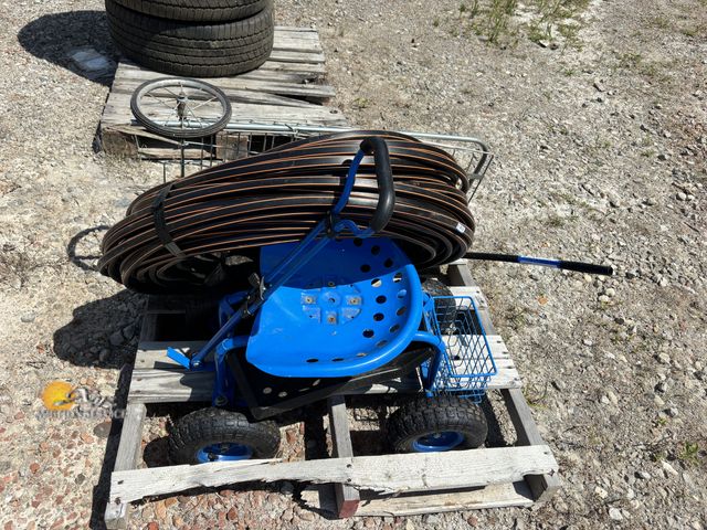 Lot 83-1040 - Garden Seat on Wheels, Metal Basket Cart on Wheels, and Roll of Drip Irrigation Tubing