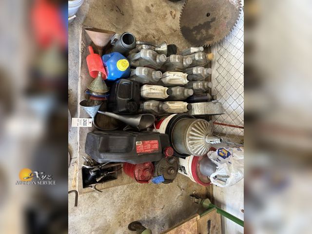 Lot 83-2430 - Lot of Used Oil, Oil Funnels, Oil Cans, and a Drain Container