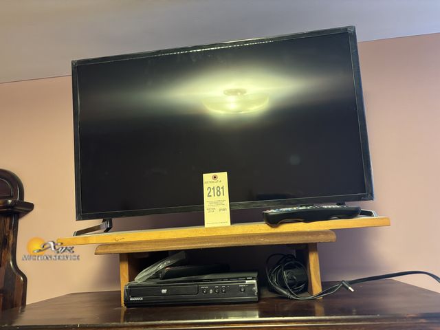 Lot 83-2181 - 32 inch TV with Stand and DVD Player