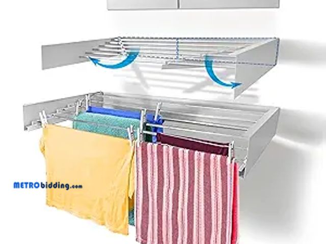 Lot 88-496784 - STEP UP 40 in. Indoor/Outdoor White Retractable Wall Mount Drying Rack Rack40White
