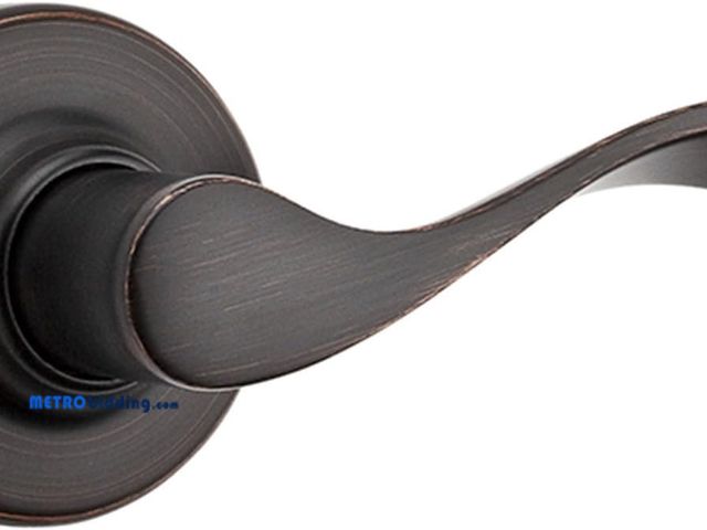 Lot 88-493348 - Kwikset Balboa Right-Handed Half-Dummy Lever in Venetian Bronze, open packaging