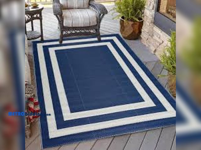 Lot 88-498626 - PLAYA RUG Paris Navy and Creme 8 ft. x 10 ft. Folded Reversible Recycled Plastic Indoor/Outdoor