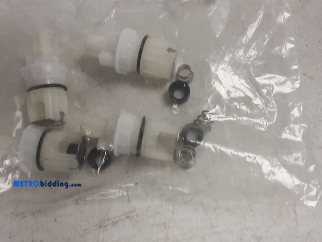 Lot 88-484532 - (4) Plastic faucet stem