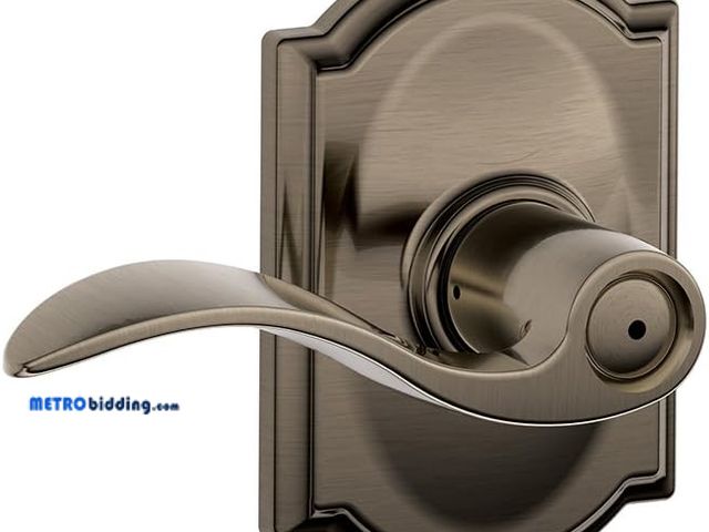 Lot 88-480584 - SCHLAGE Accent Lever with Camelot Trim Bed and Bath Lock in Antique Pewter